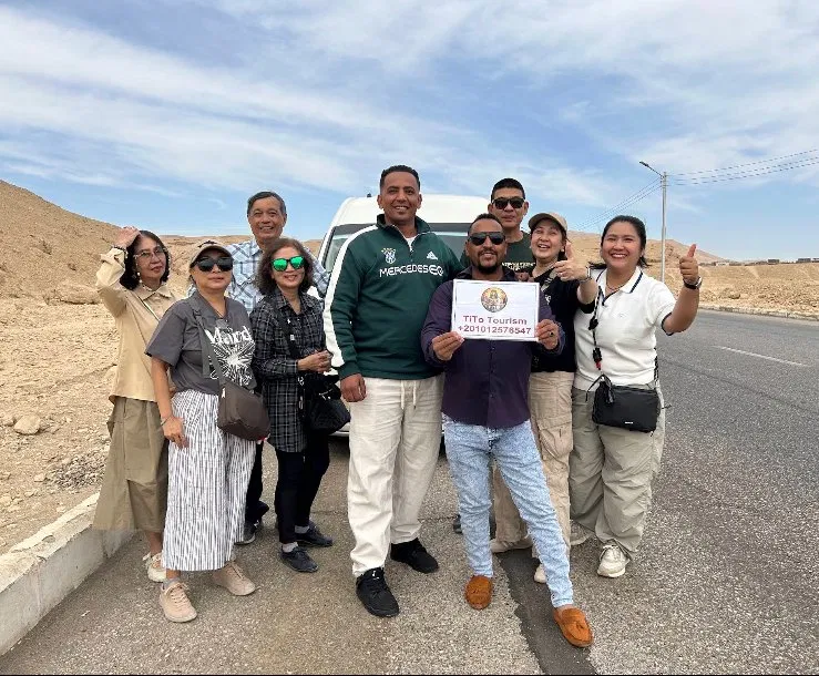 Tour group on desert road near Luxor West Bank