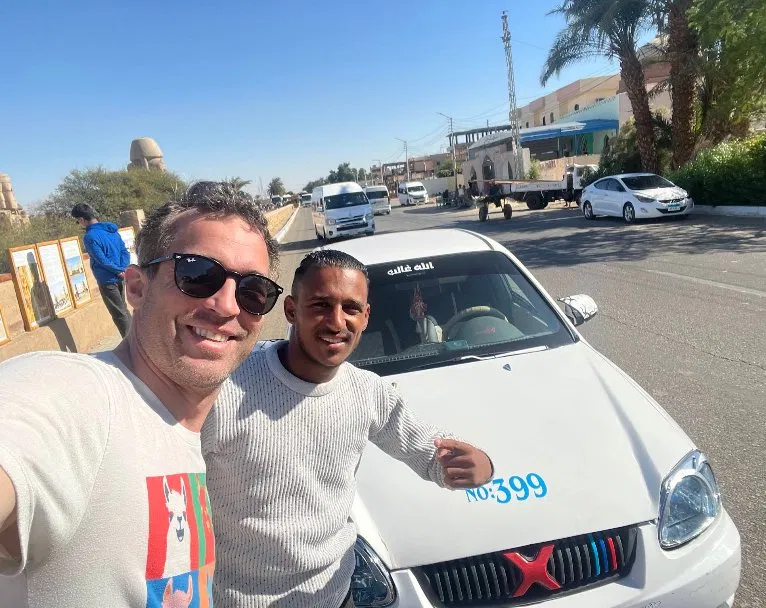 Tito's taxi driver and tourist near Karnak Temple, Luxor